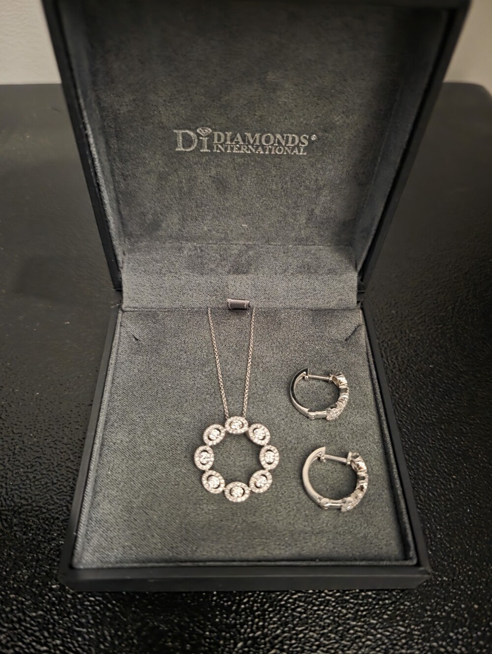 Circle Of Life Diamond Pendant Necklace in 18K White Gold. Matching Earrings.